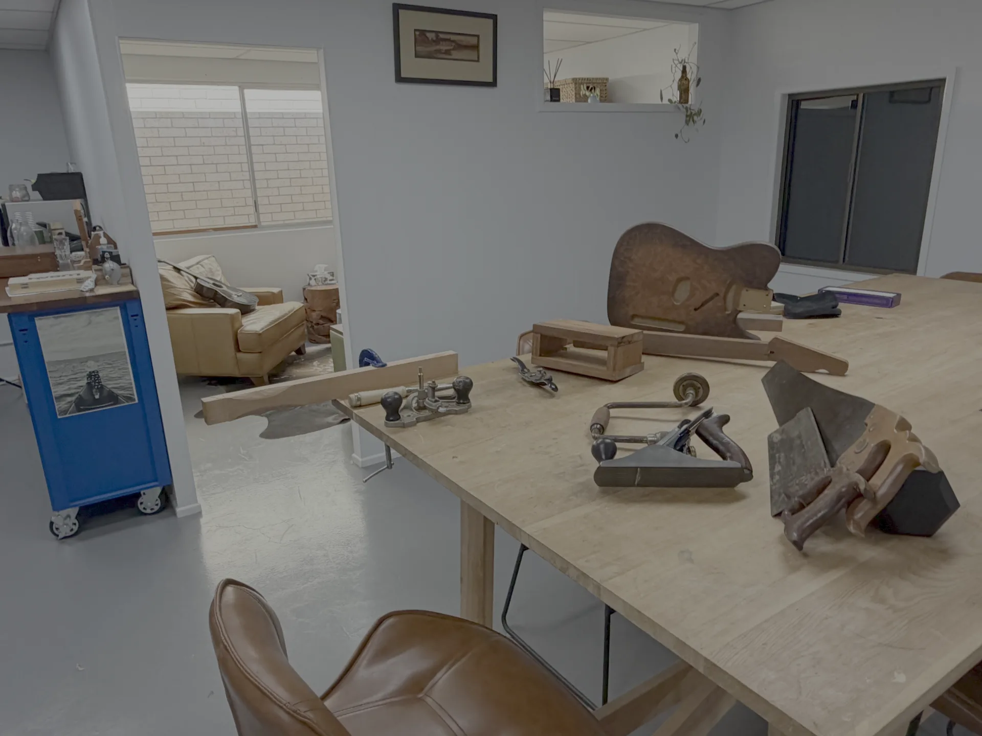 A tradesman's workbench with timber hand tools
